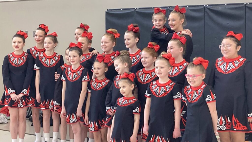 group of young dancers standing together