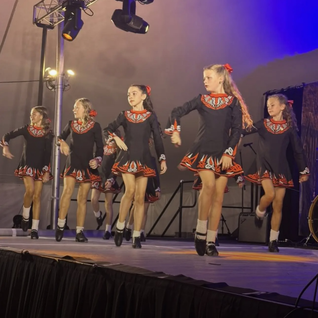 Dancers on stage at Celtic Classic.